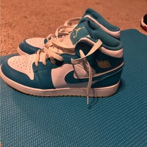 Air Jordan 1s mids size 7 gently used,